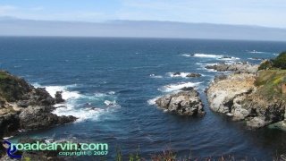 Caves Below: One of my favorite spots to take photos on Highway 1. The ocean can be calm or the waves may be crashing on the rocks.